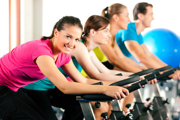 Indoor bycicle cycling in gym