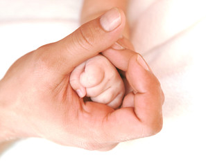 Father's and baby's hands