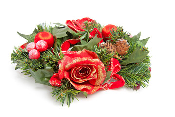 christmas wreath with red roses over white background