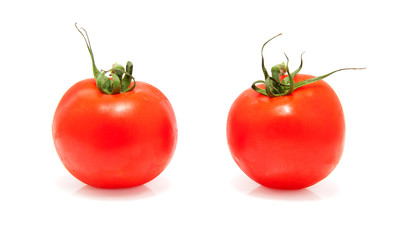 Two fresh tomatoes over white background