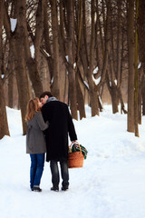 young couple on winter picnic