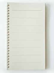 An opened brown page spiral notebook