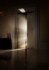 Fototapeten Mysterious rays of light behind door © konradbak
