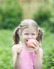 Pretty Little girl with a Apple.