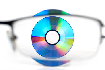 DVD with glasses on white background