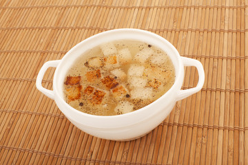 Chicken broth with egg and breadcrumbs