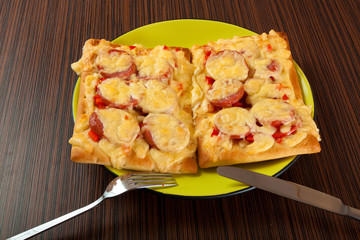 Pizza on green plate