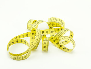 Yellow measuring tape isolated on white background