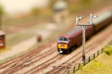 model train locomotive passing signals with shallow d.o.f