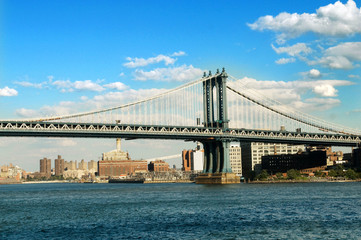 Brooklyn bridge in New York on bright summer day