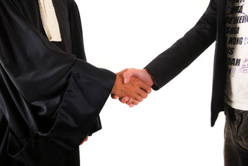 Justice - Poignet de mains entre avocat et client © Patricia W.
