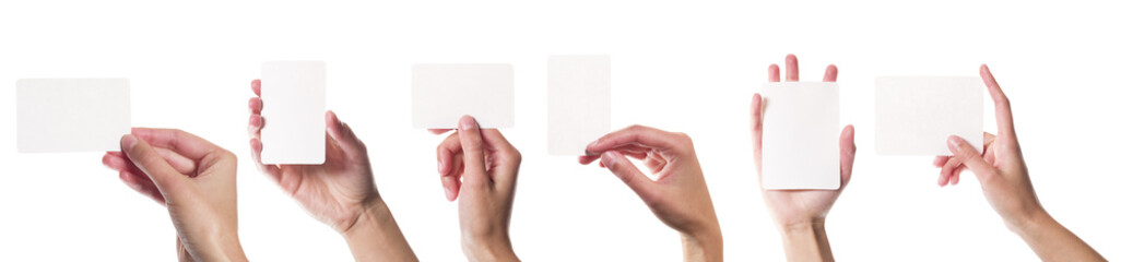 Collection of card blanks in a hand on white background