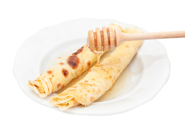 Pancakes with honey isolated with clipping path