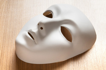 Theatre concept with the white plastic masks
