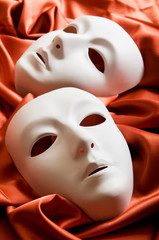 Theatre concept with the white plastic masks