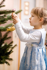 girl with christmas tree