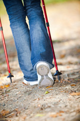 Nordic walking race on autumn trail