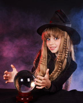 Girl holding crystal ball.