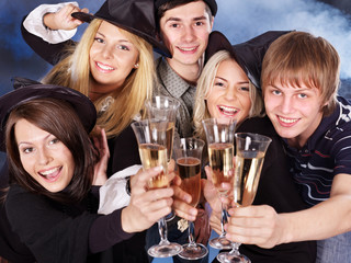 Group young people drinking champagne.