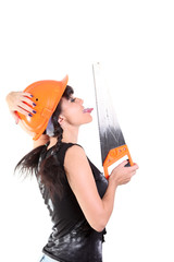 Girl in hard hat licks a saw