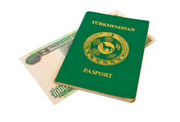 Fototapeta premium Turkmenistan passport and money on white background