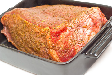 marinated ready to cook roasbeef on white