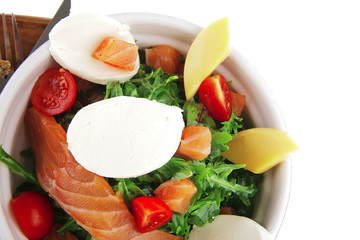 salad with smoked salmon in bowl