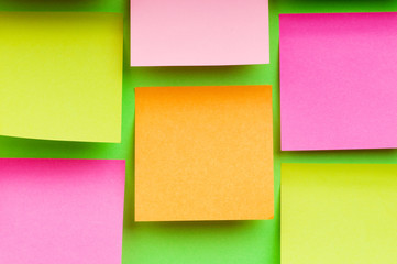 Reminder notes on the bright colorful paper