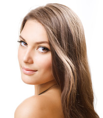Fototapeta premium Beautiful Girl with long hair. Portrait over white.Perfect Skin