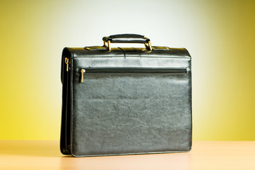 Leather case on the table against background