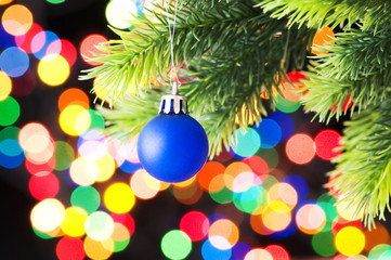 Fototapeta na wymiar Christmas decoration and blurred lights at background