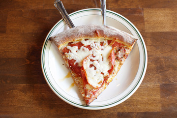 Slice of pepperoni pizza