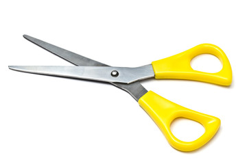 Yellow andled scissors isolated on a white