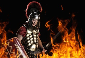 Angry legionary soldier in the fire