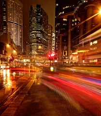 Fototapeta na wymiar Fast moving cars at night