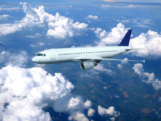 Airplane above clouds