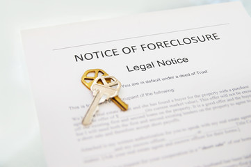 Notice of Foreclosure document and house key