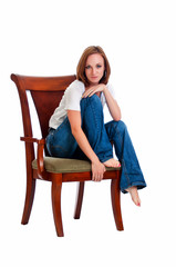 Pretty woman in an arm chair.