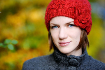 Young beautiful woman in autumn