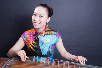 girl playing Chinese zither