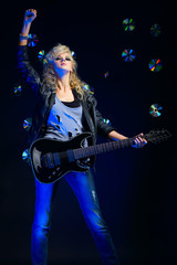 blonde girl with guitar