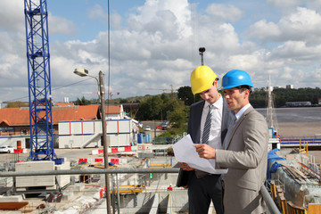 Businessmen on construction site