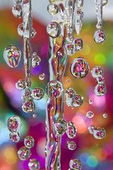 Colorful drops of rain . Water background.