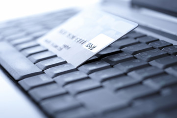 Credit card and laptop. Shallow DOF