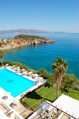 Naklejka na ściany i meble Swimming pool at the beach of luxury hotel, Crete, Greece