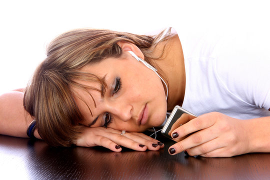 Teenage Girl Listening to Music. Model Released