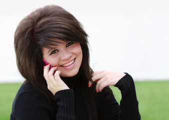 Beautiful teen talking on the phone