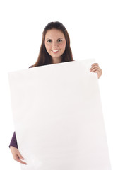 Smiling female holding big blank sign (isolated)