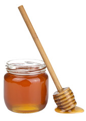 honey in jar and dipper isolated