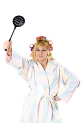funny housewife with curlers and skimmer